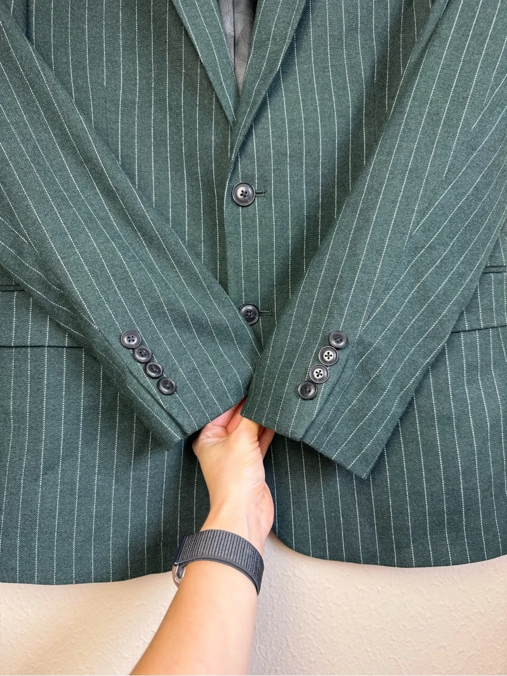 Nick Graham green pinstripe suit blazer